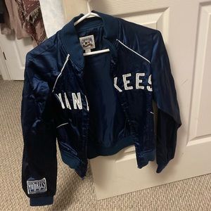 New York Yankees royal blue jacket with side pockets and zipper in the front